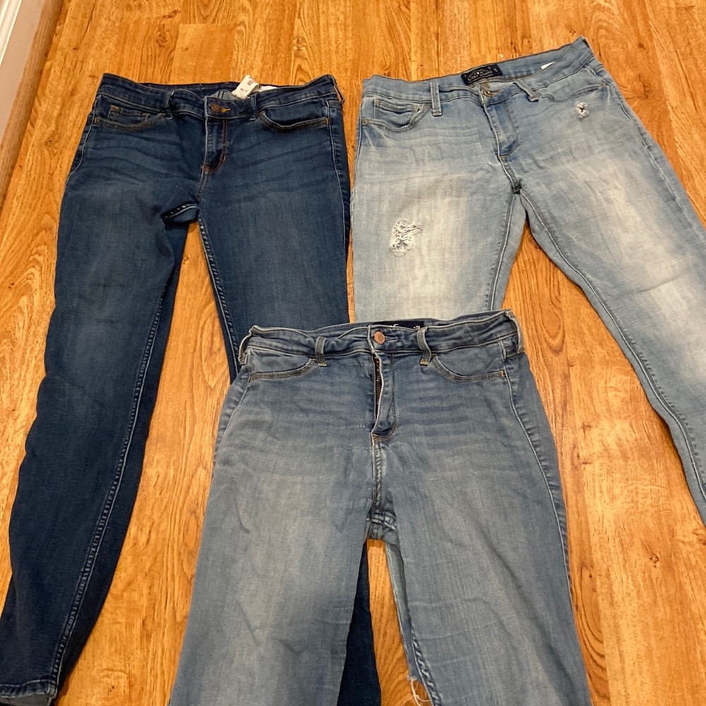 Three pairs of jeans, 2 pairs of Hollister &1 pair lucky brand,